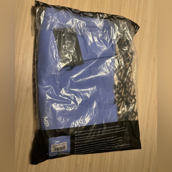 MyProtein composure seamless long sleeve crop top. Ice blue or purple. Size S - Picture 8 of 8